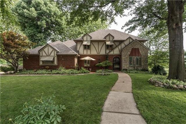 Stunning, timeless Two Story nestled at the end of a cup-de-sac and right on the golf course!