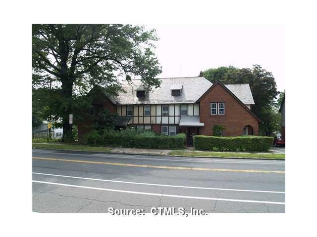 Exterior Front. Four Plex Town Houses, Slate Roof 