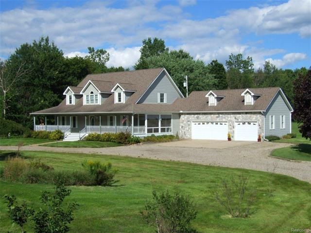 Sprawling Cape Cod on 3.7 Acres with 3 car heated 