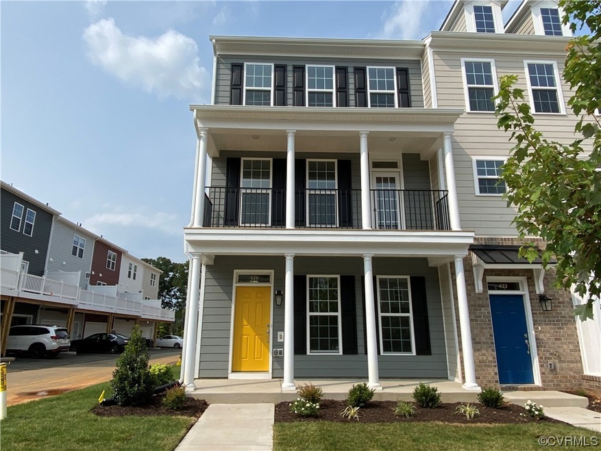 View of front facade featuring balcony
