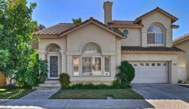 Beautiful curb appeal welcomes you home!  Prime lo