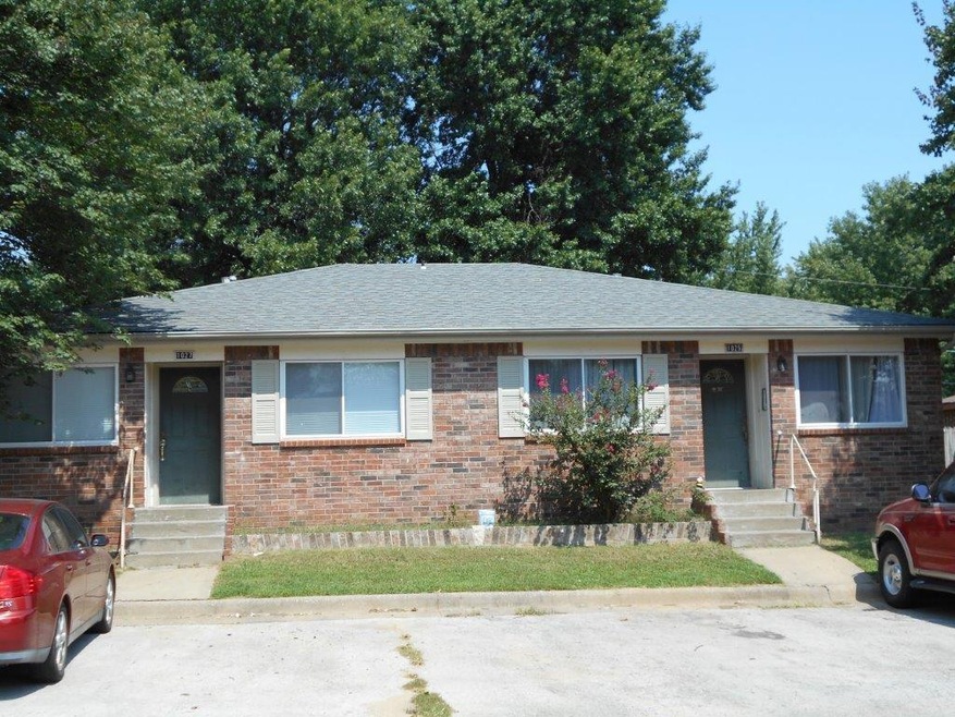 1025 & 1027 W Hendrix St, Rogers, AR 72756 - photo 1
