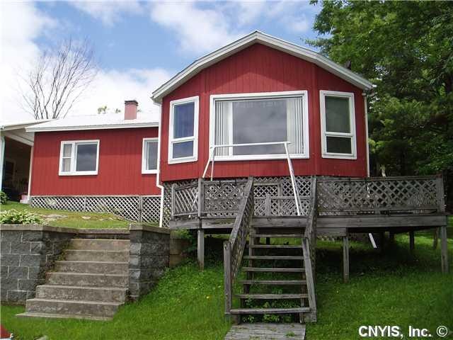 Exterior Front. View from the water. The large gre