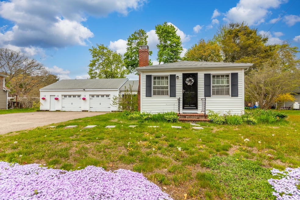 Front of house with 2 car garage