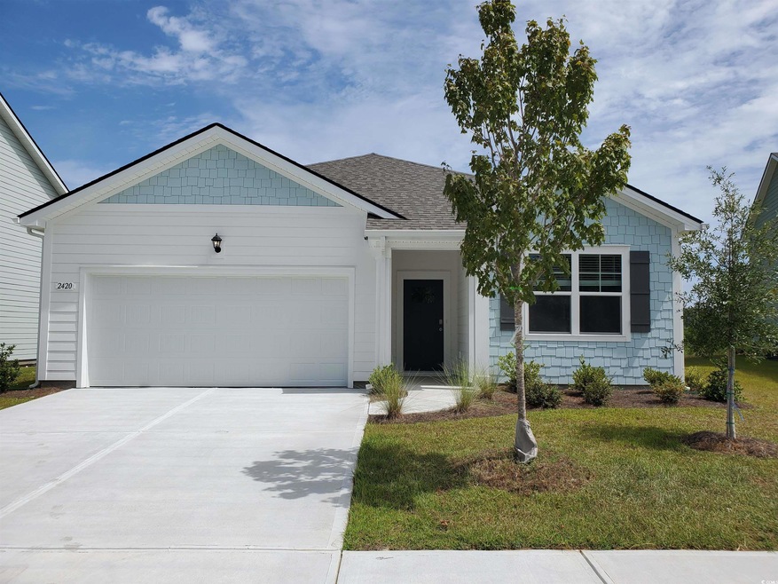 View of front of house featuring a front yard and 
