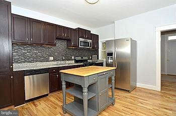 1730 E 30th St, Baltimore, MD 21218 - photo 1