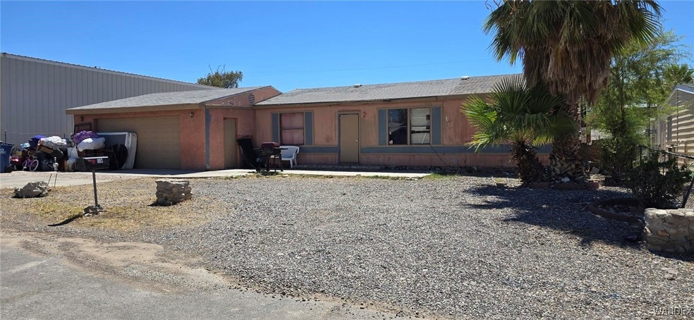 Front of house and garage.