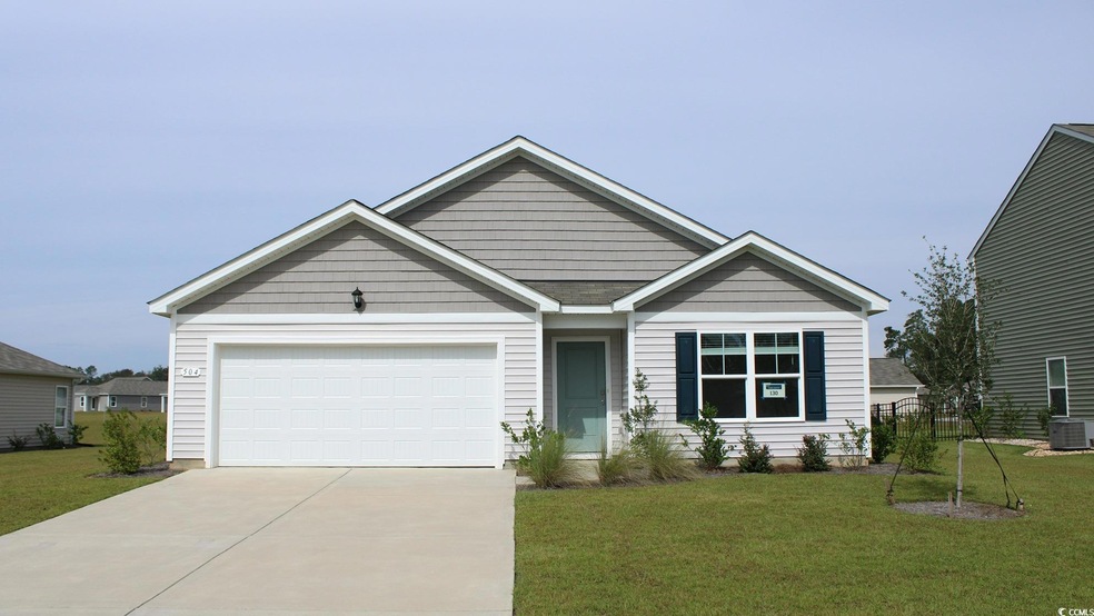 View of front of property featuring concrete drive