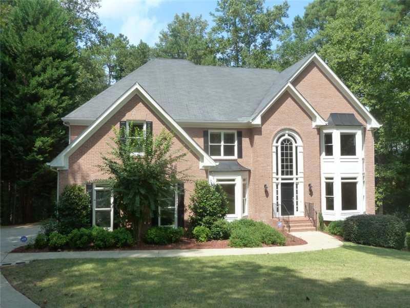 Exterior Front. 4 sided brick traditional on 1+ ac