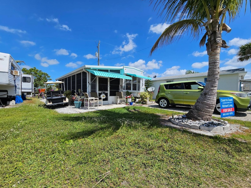 15175 Stringfellow Rd unit 11, Bokeelia, FL 33922 - photo 1