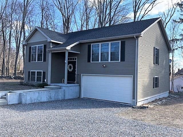 Front View with under house 2 car garage