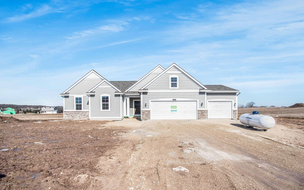 12155 Apple Cart Ln, Lowell, MI 49331 - photo 1