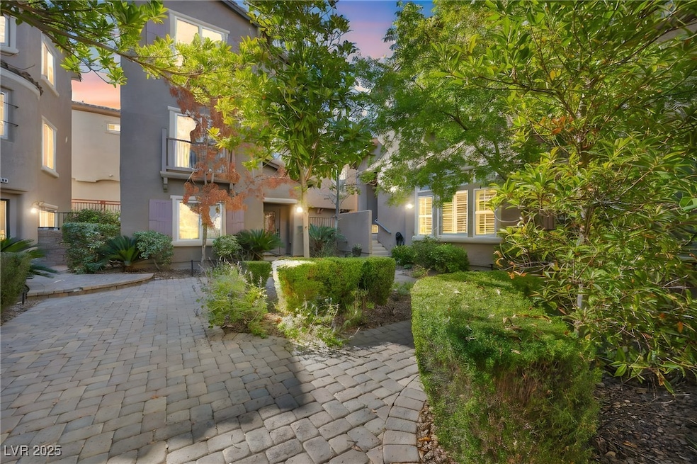 At twilight, the courtyard glows with warm lighting—creating a tranquil outdoor atmosphere perfect for evening conversations with neighbors or quiet relaxation.