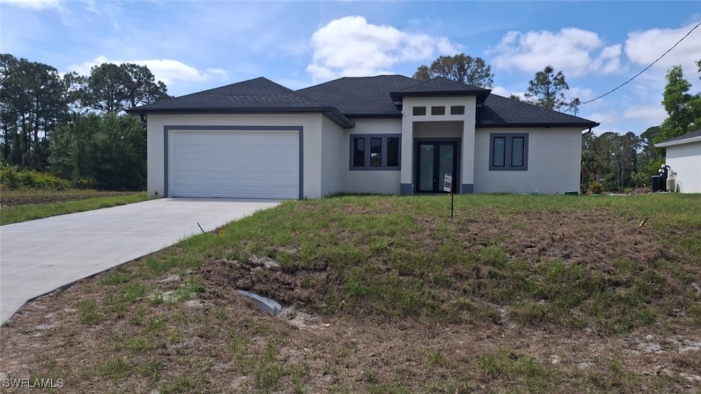 Prairie-style house with an attached garage, a shi