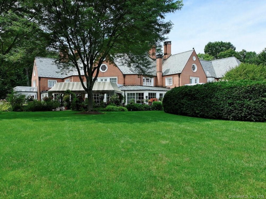 Expansive backyard with lush grounds and extensive