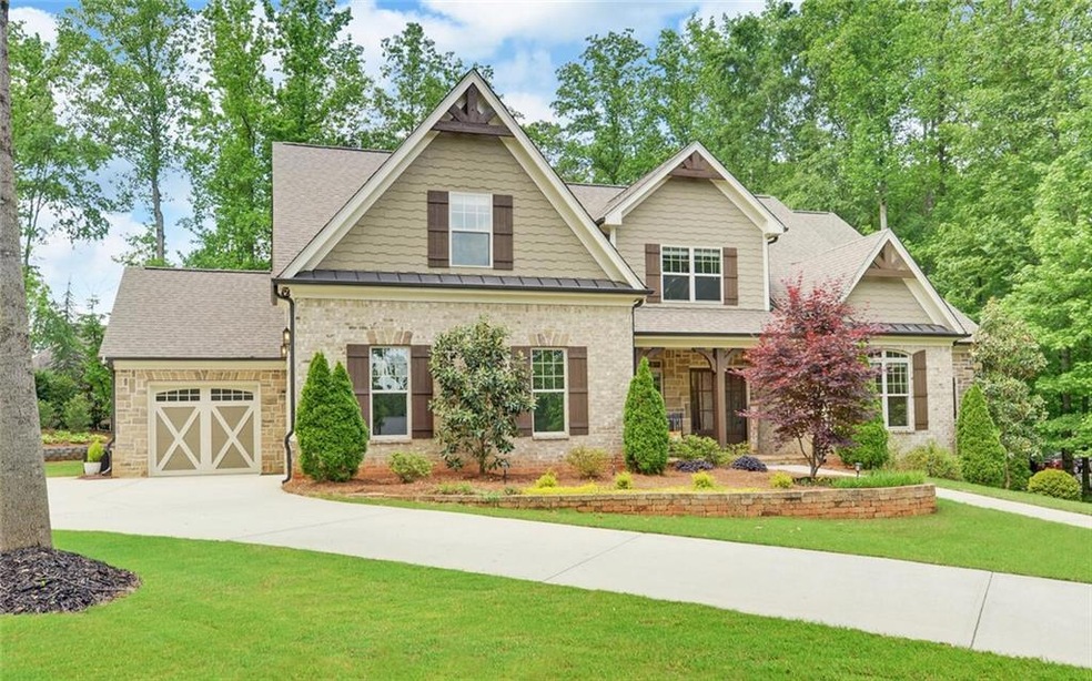 Craftsman-style house featuring a garage and a fro
