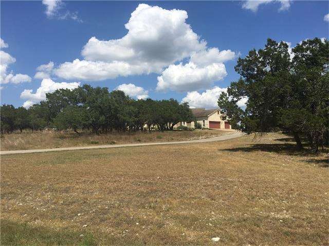 The long driveway provides privacy from the road and gorgeous Oaks!