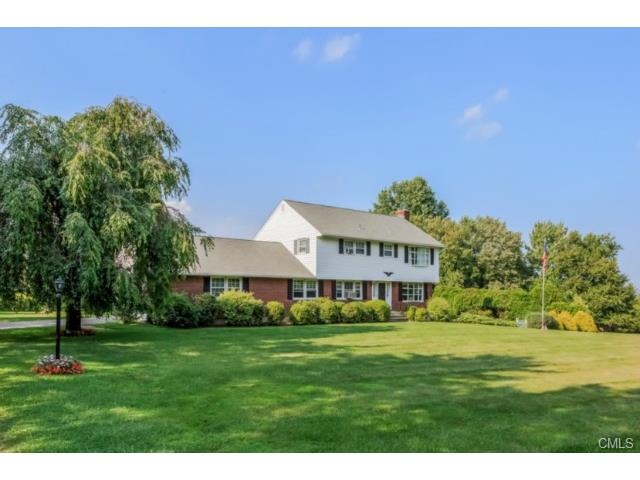 Lovely colonial on beautifully landscaped lot.