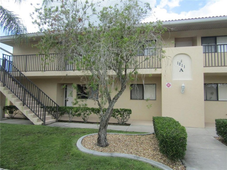 FRONT VIEW.  CONDO IS FIRST FLOOR, LEFT CORNER UNIT