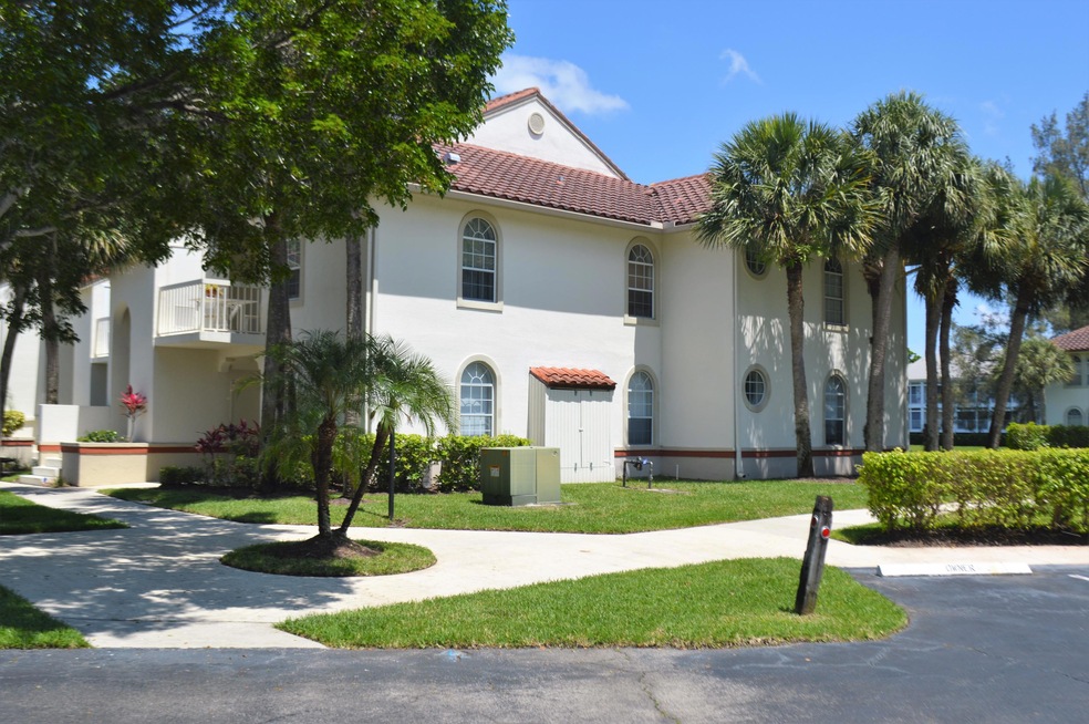 128 Cypress Point Dr unit 128, Palm Beach Gardens, FL 33418 - photo 1