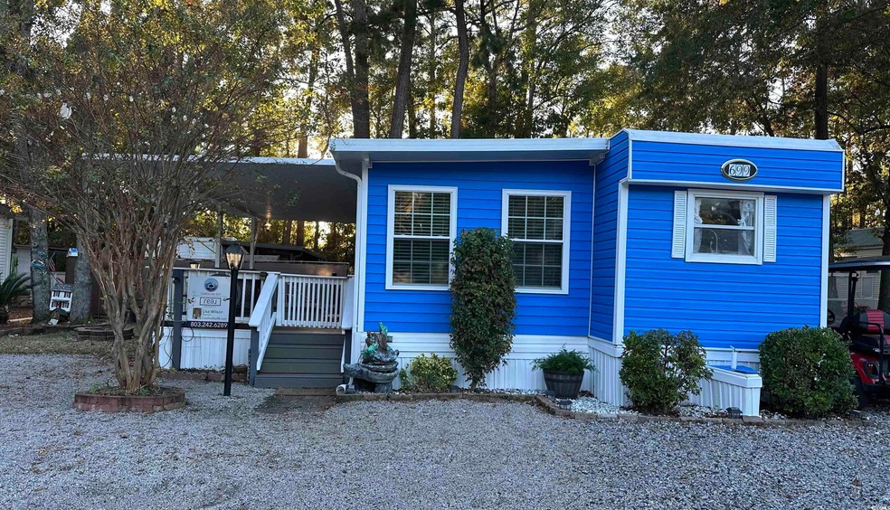 View of front of property with a deck