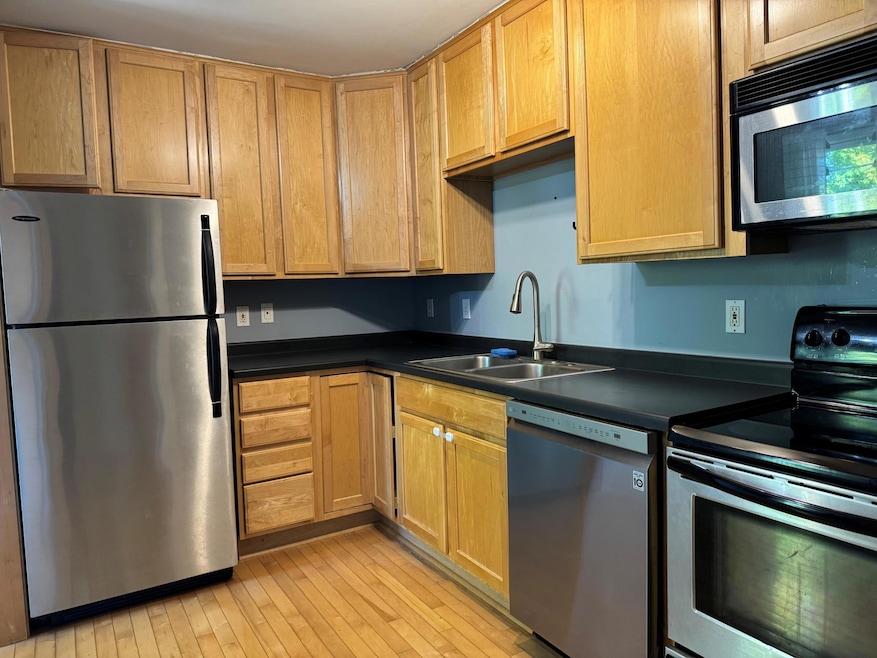 updated kitchen with stainless appliances