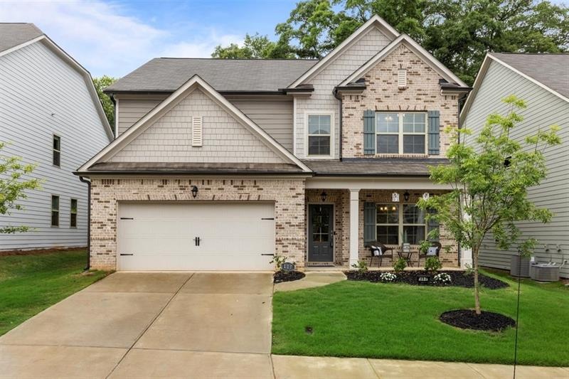 Craftsman style with brick and cement siding