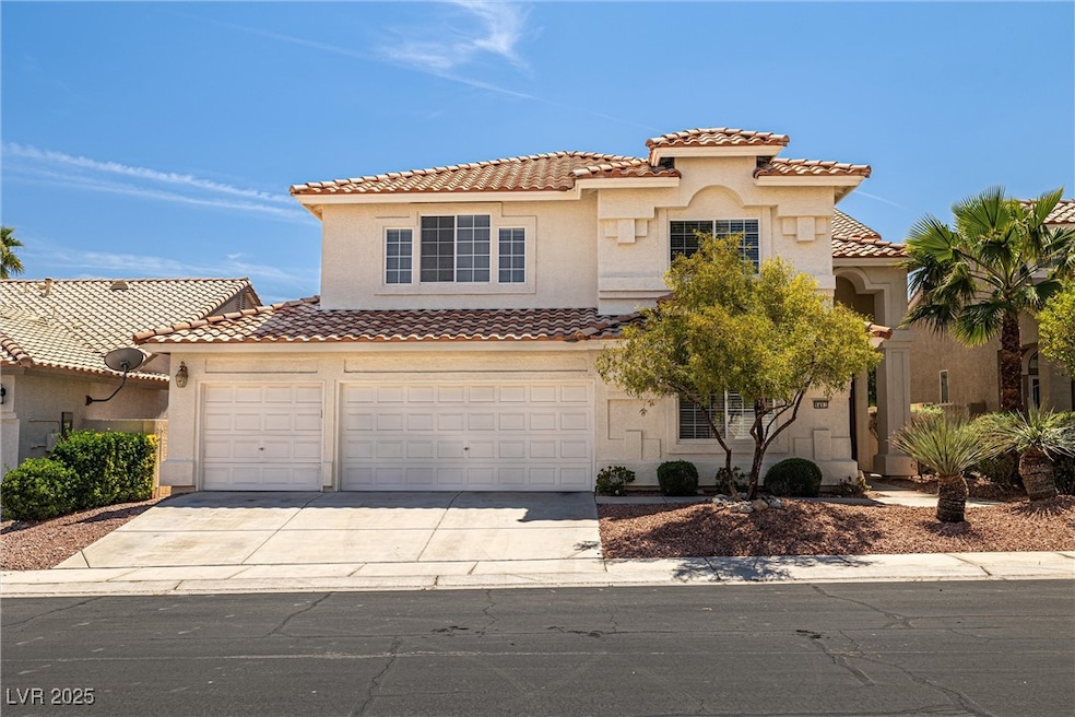 Mediterranean / spanish home with stucco siding, a