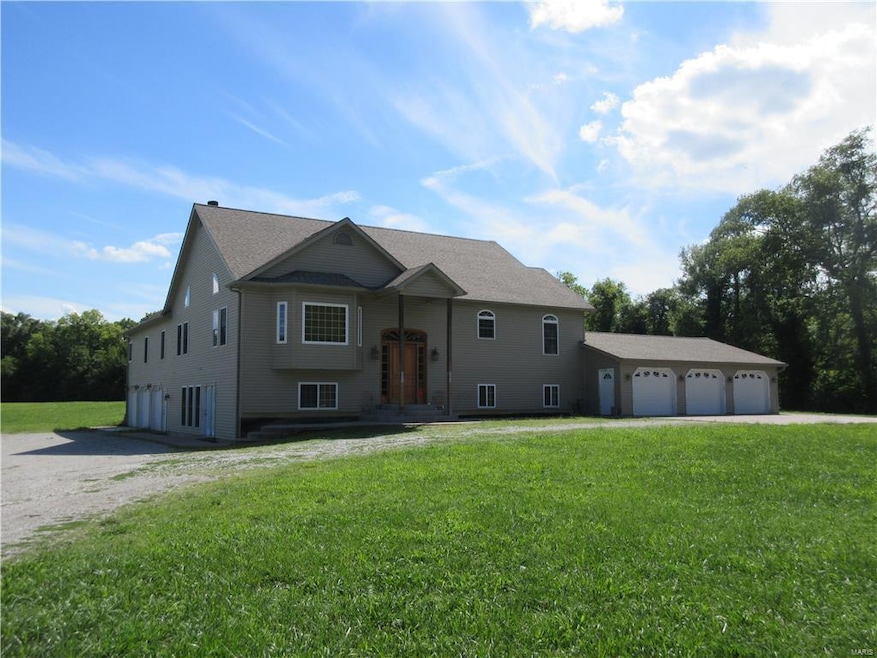 Welcome to 431 Arlington Dr, home of the 6 garage bays!