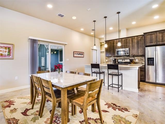 Lovely open kitchen and dining area complete with 