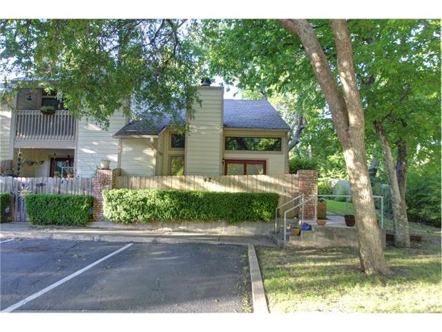 Back of Unit with Parking Spaces and Yard