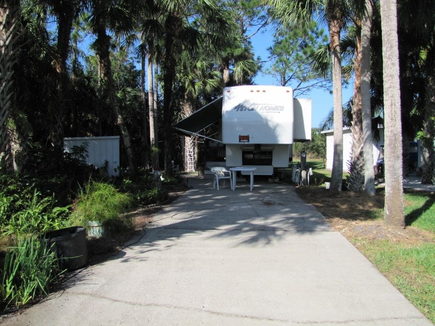 213 Plantation Dr unit 23350600515, Titusville, FL 32780 - photo 1