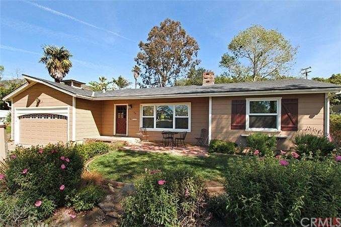 Front of home showing newer over sized dual pane w