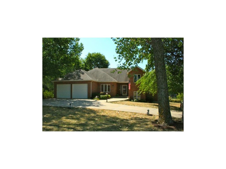 Beautiful treed 1 acre lot with circle drive and b