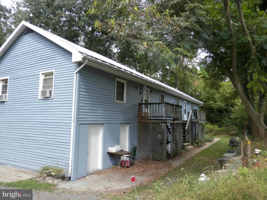 102 Creekside Ln unit 100-102, Edinburg, VA 22824 - photo 1