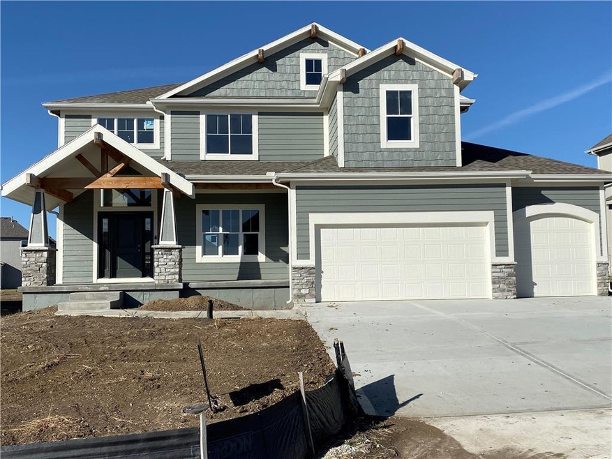 Extra large front porch. Spacious 3 car garage.