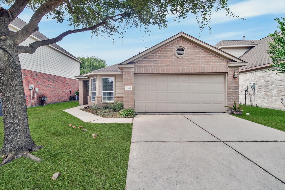 2355 Urban Forest Ct, Spring, TX 77386 - photo 1