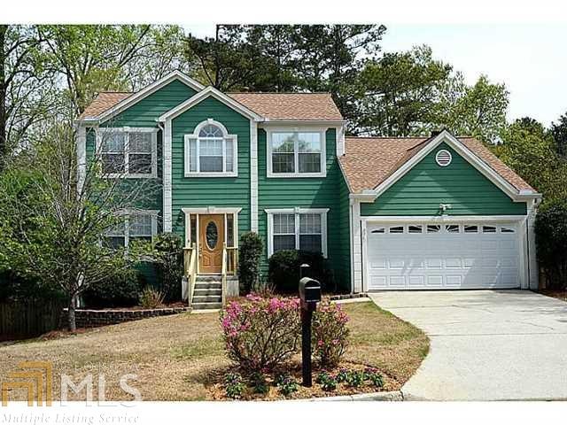 This charming home boasts curb appeal galore and a