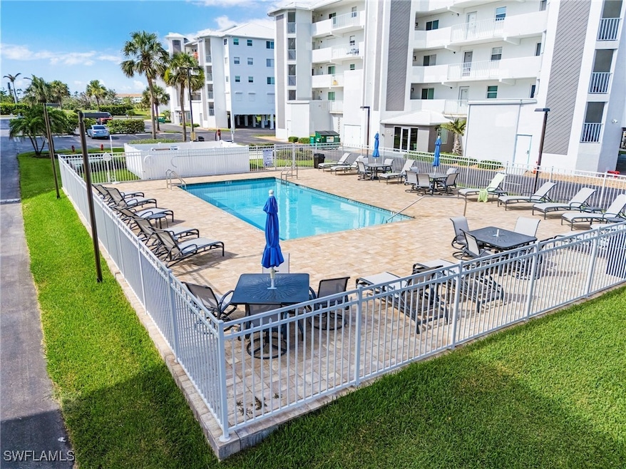 Community pool with a patio area
