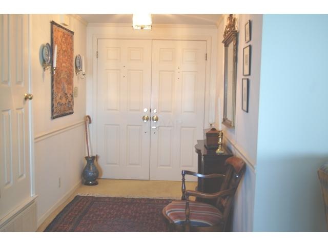 Enter this custom unit into the entry hall through