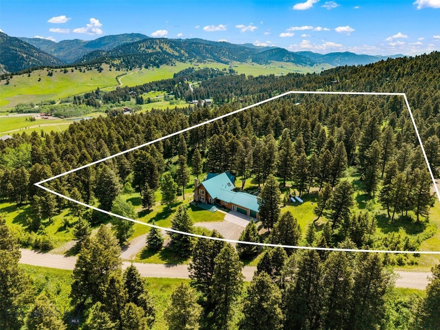 Gorgeous, park-like setting on 5+ acres