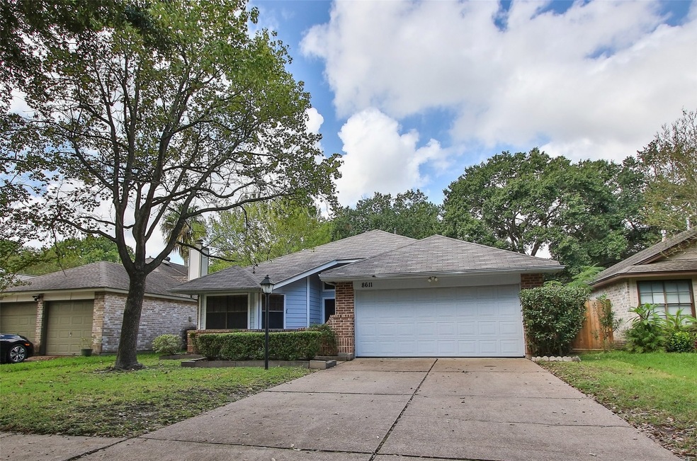8611 Sparkling Springs Dr, Houston, TX 77095 - photo 1
