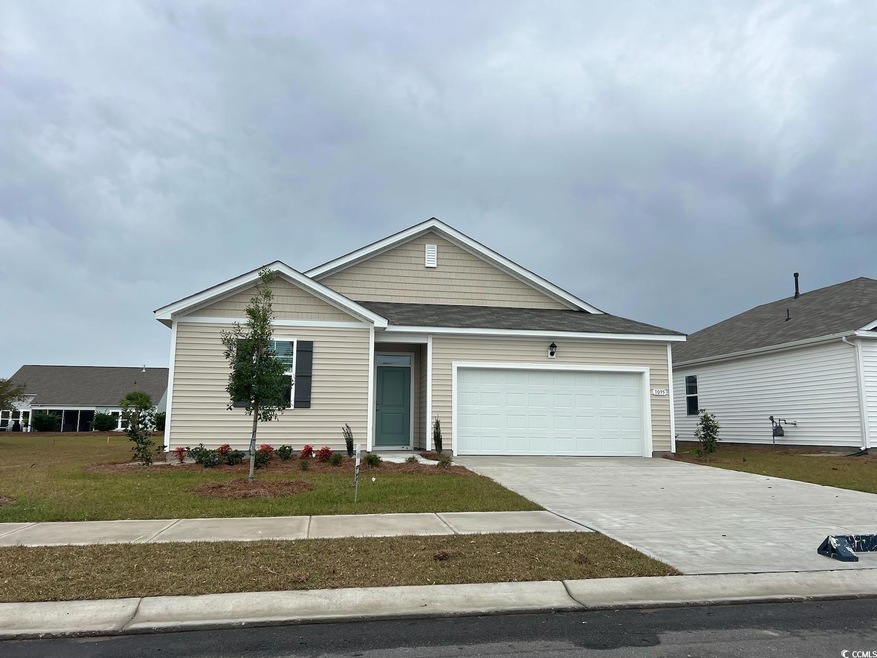 Ranch-style home featuring a garage