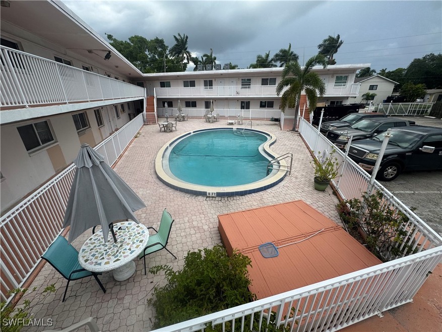 Community pool featuring a patio area