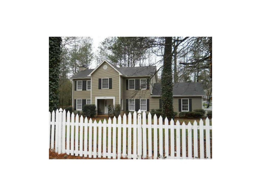 Exterior Front. White picket fence adorable!
