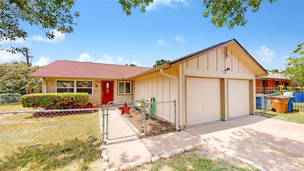 Single story home with board and batten siding, a