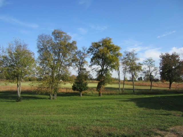 View of lot from street.  Awesome long view of golf course.