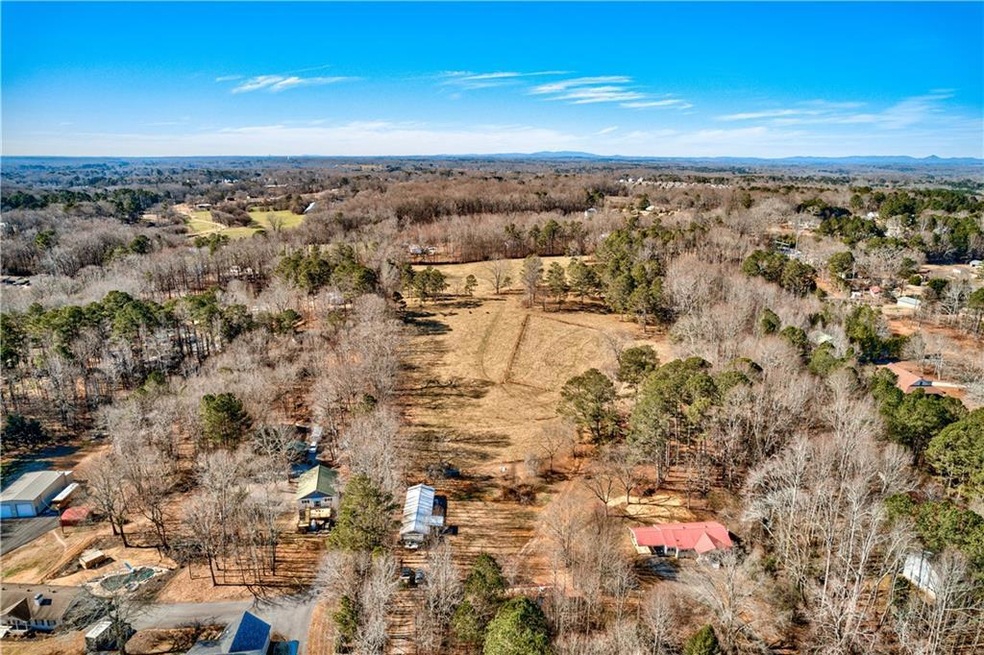 Aprox. 15 Acres + 2 Homes