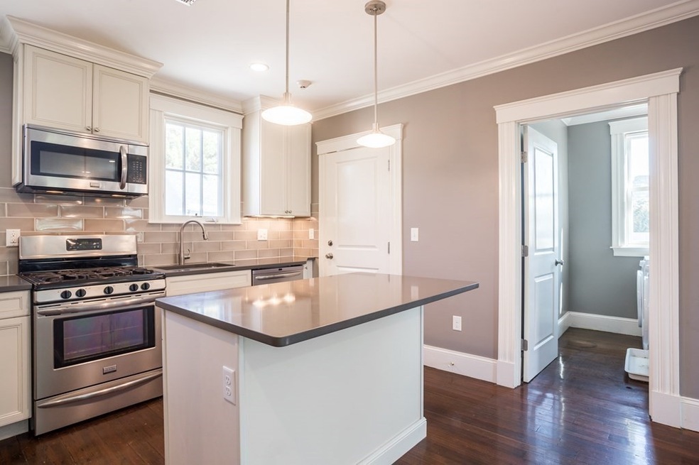 390 Langley Rd unit 1, Newton Center, MA 02459 - photo 1