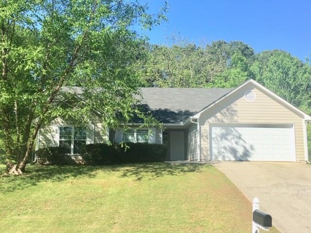 Beautiful ranch W/ lovely landscaping.